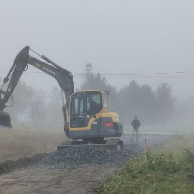 Excavator is making a road