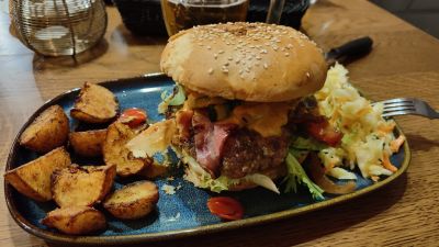 Lovely burger with potatoes and salad