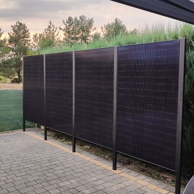 Ja Solar bifacial solar panels on vertical fence
