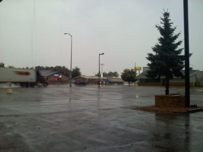 Driving a motorbike in rain and storm 