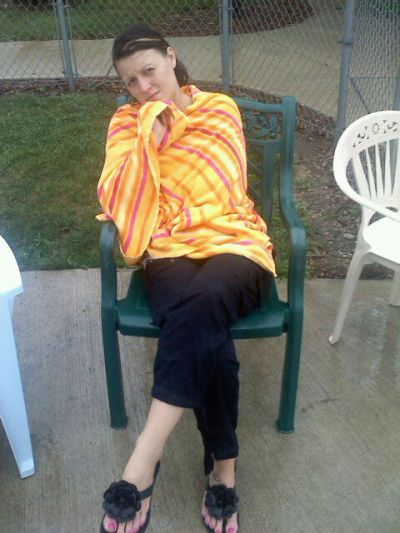 casey by the pool in the rain