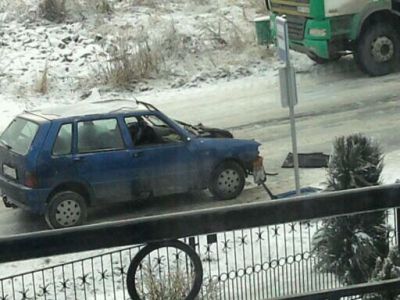 Dangerous accident on the street. Car accident with a truck.