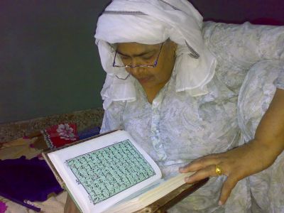 Reading Koran at home